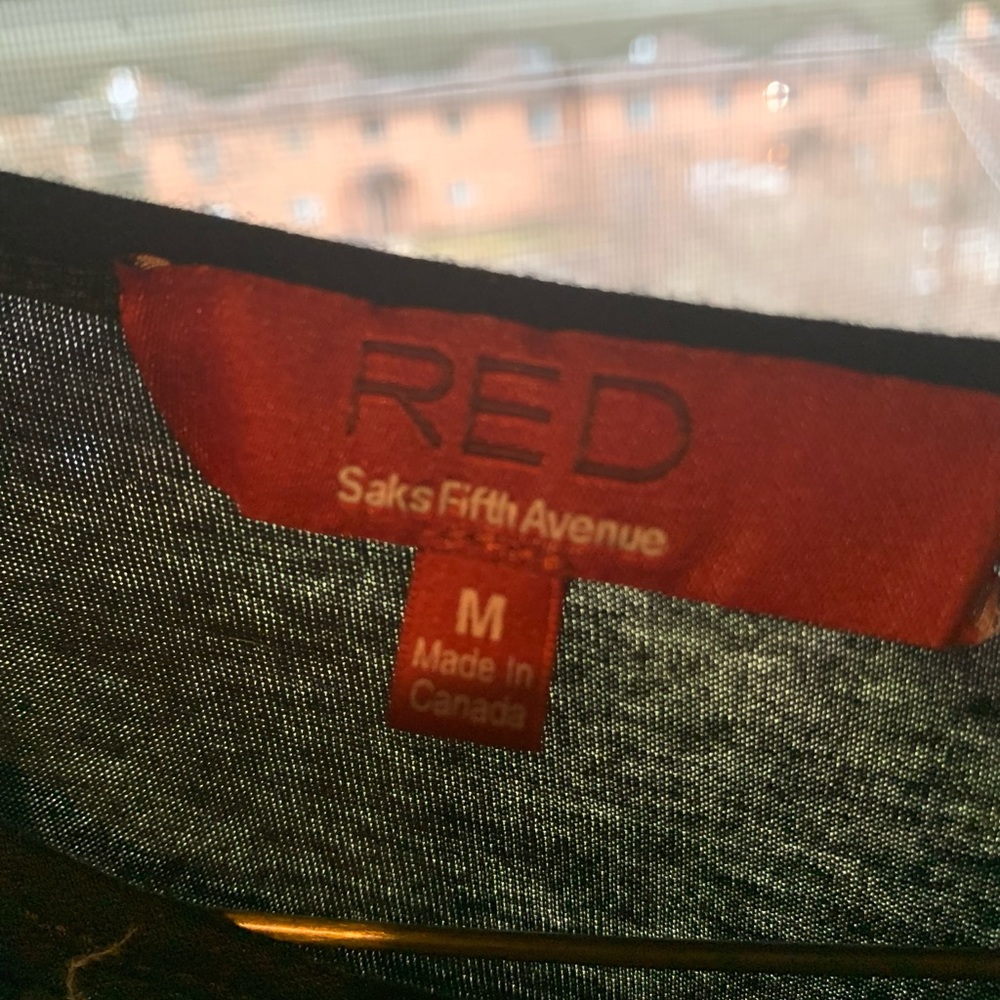 Sexy black top from Saks Fifth Ave- Red brand